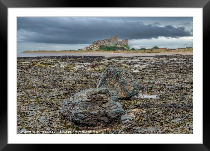 Bamburgh and Rock Framed Mounted Print by Darrell Evans