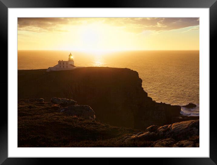 A hazy sunset over Stoer Lighthouse Framed Mounted Print by Anthony McGeever
