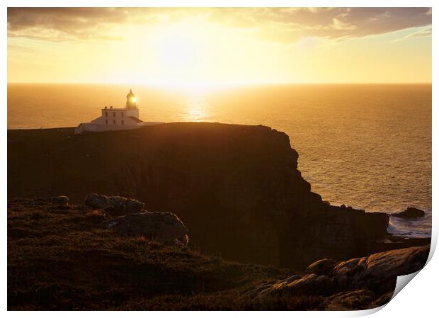 A hazy sunset over Stoer Lighthouse Print by Anthony McGeever