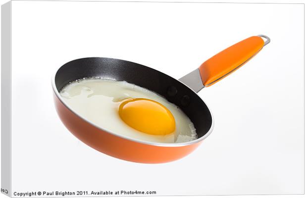 Fried Egg in Frying Pan Canvas Print by Paul Brighton