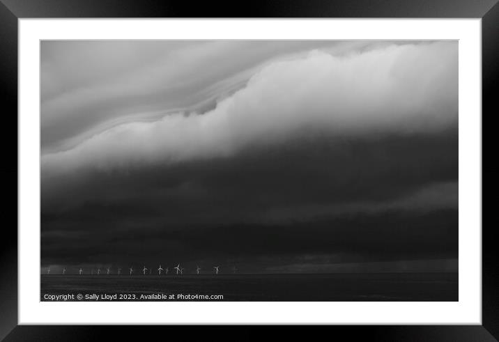 Storm clouds on the east coast of Norfolk Framed Mounted Print by Sally Lloyd