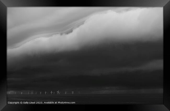 Storm clouds on the east coast of Norfolk Framed Print by Sally Lloyd