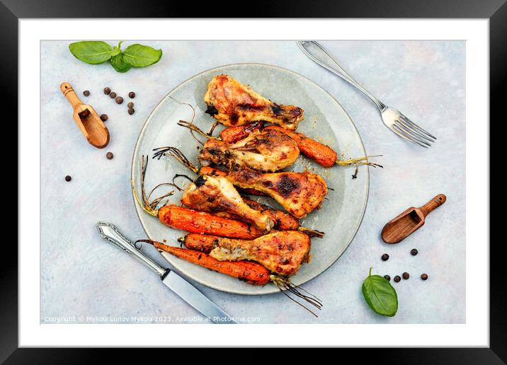 Baked chicken drumstick, legs with carrots Framed Mounted Print by Mykola Lunov Mykola