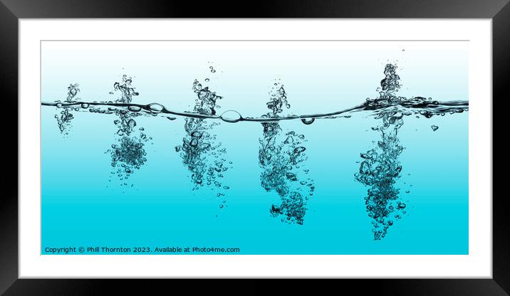 A series of bubbles in turquoise blue water Framed Mounted Print by Phill Thornton