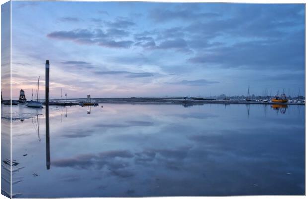 Pre sunrise cloud and reflections over the Brightlingsea Harbour  Canvas Print by Tony lopez