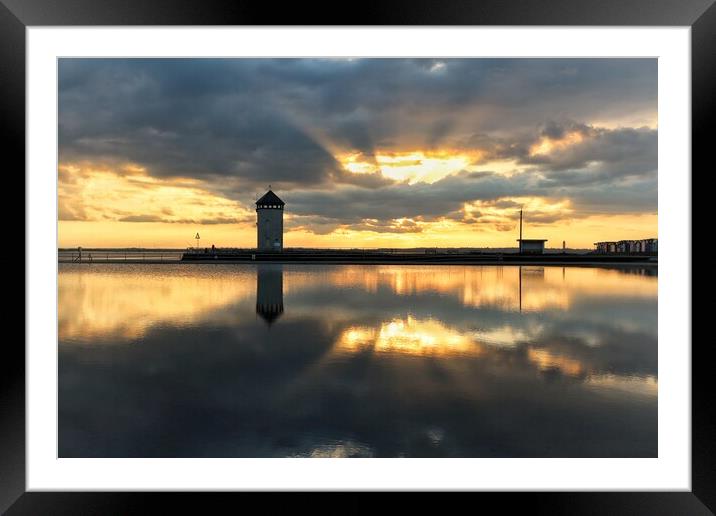 Sunset colours and reflections over Brightlingsea tidal pool  Framed Mounted Print by Tony lopez