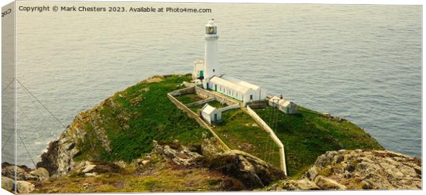 South Stack lighthouse from the cliff Canvas Print by Mark Chesters