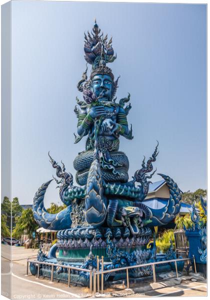 Statue at the Blue Temple, Canvas Print by Kevin Hellon