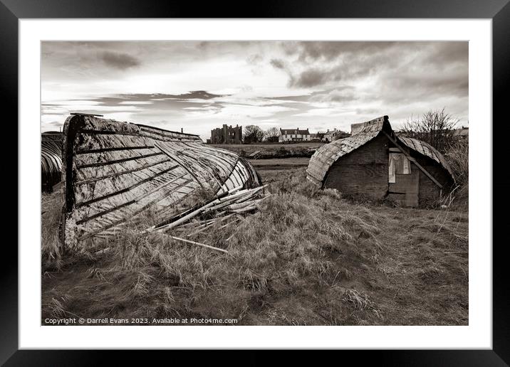 Lindisfarne Boat Sheds Framed Mounted Print by Darrell Evans