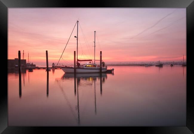 Sunrise colours over Brightlingsea Harbour  Framed Print by Tony lopez