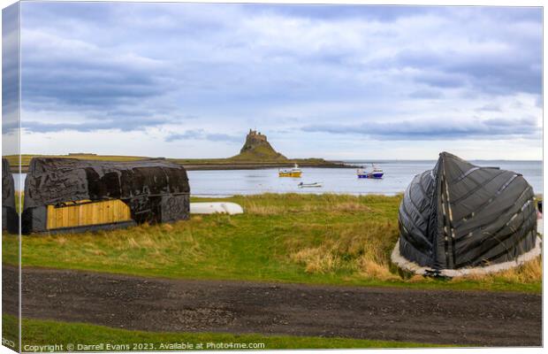 Holy Island Huts and Castle Canvas Print by Darrell Evans