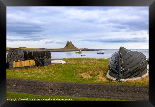 Holy Island Huts and Castle Framed Print by Darrell Evans