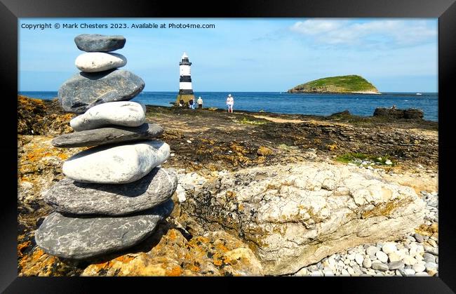 Pebbles stack Framed Print by Mark Chesters