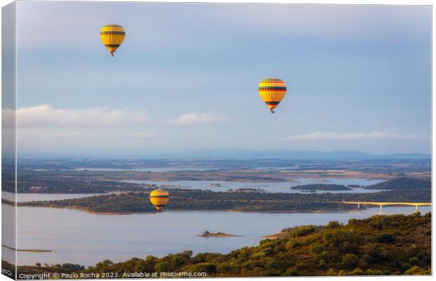 Hot air balloons over the river landscape in Monsaraz, Alentejo, Portugal  Canvas Print by Paulo Rocha
