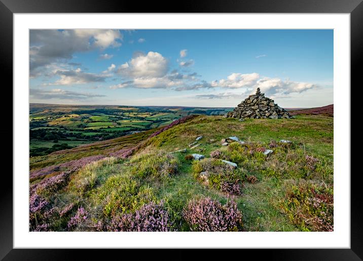 Pile of stones looking over Rosedale Abbey, North  Framed Mounted Print by Martin Williams
