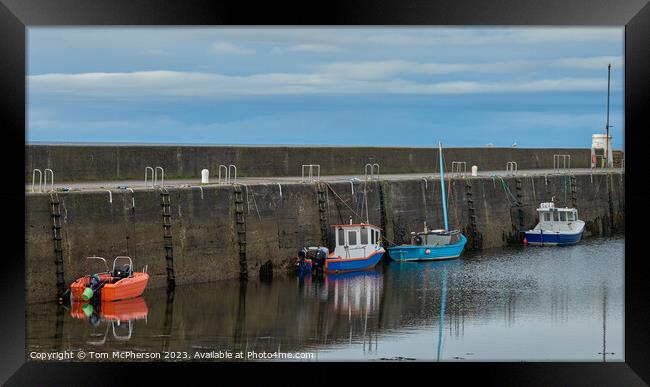 Serene Rowboats at Hopeman Harbour Framed Print by Tom McPherson