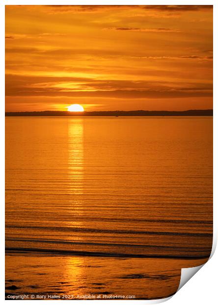 The sun setting over the Welsh coast Print by Rory Hailes