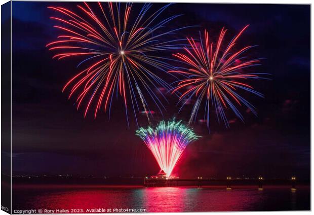Fire works off the Pier with multiple colours Canvas Print by Rory Hailes