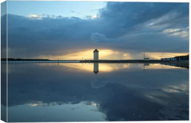 Sunset cloudscape colours and reflections over Brightlingsea tidal pool  Canvas Print by Tony lopez