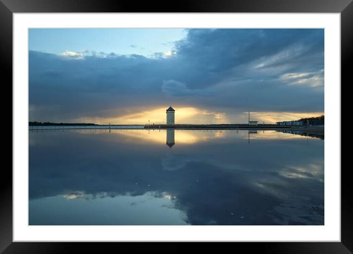 Sunset cloudscape colours and reflections over Brightlingsea tidal pool  Framed Mounted Print by Tony lopez