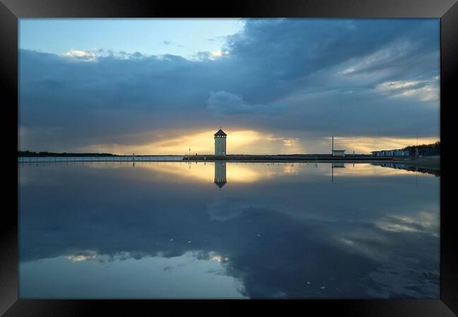 Sunset cloudscape colours and reflections over Brightlingsea tidal pool  Framed Print by Tony lopez