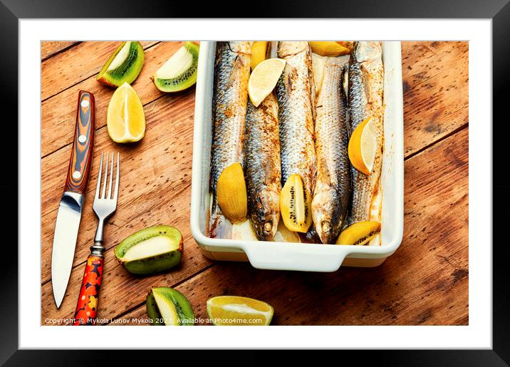 Baked whole fish with kiwi and lime. Framed Mounted Print by Mykola Lunov Mykola