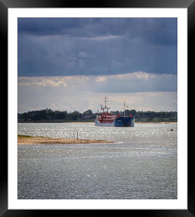 Arriving at Brightlingsea Harbour in the afternoon sun   Framed Mounted Print by Tony lopez