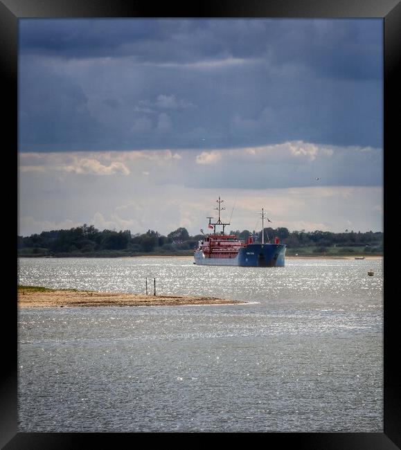 Arriving at Brightlingsea Harbour in the afternoon sun   Framed Print by Tony lopez