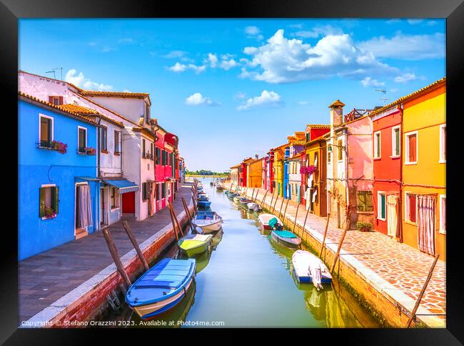 Burano island canal, colorful houses and boats. Venice lagoon Framed Print by Stefano Orazzini