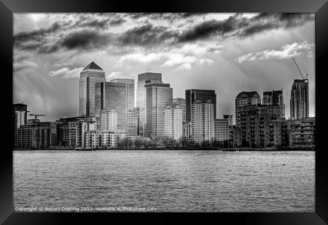 Canary Wharf FRom Across The Thames Framed Print by Robert Deering