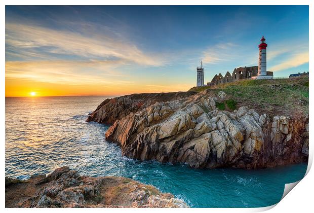 Sunset over the lighthouse at Pointe Saint Mathieu Print by Helen Hotson