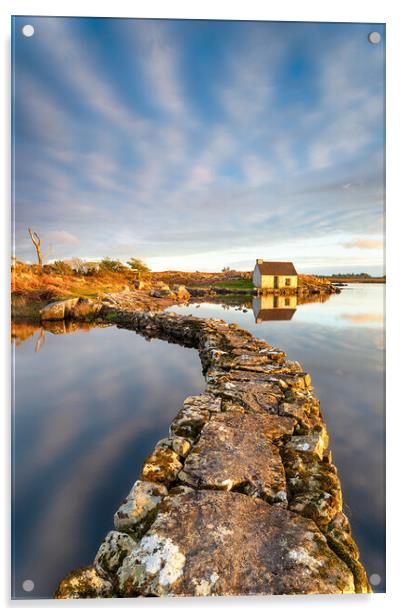An old stone jetty across a lake leading to a small cottage Acrylic by Helen Hotson