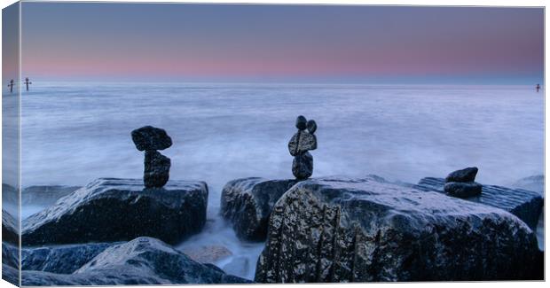 Stone Stack in the sea Canvas Print by robert walkley