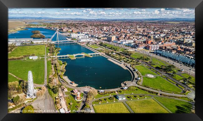 Southport Marine Lake and Townscape. Framed Print by Phil Longfoot