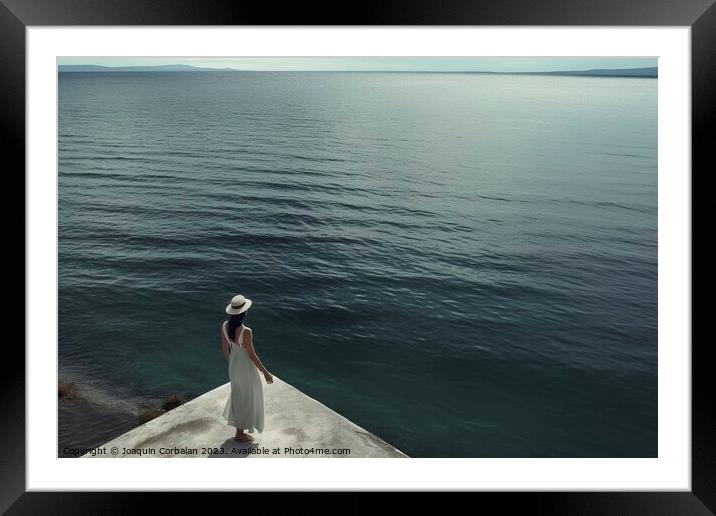 woman in the stunning dress walks fearlessly on the edge of the  Framed Mounted Print by Joaquin Corbalan