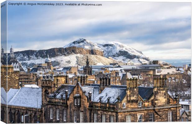 Salisbury Crags and Arthur’s Seat in snow Canvas Print by Angus McComiskey