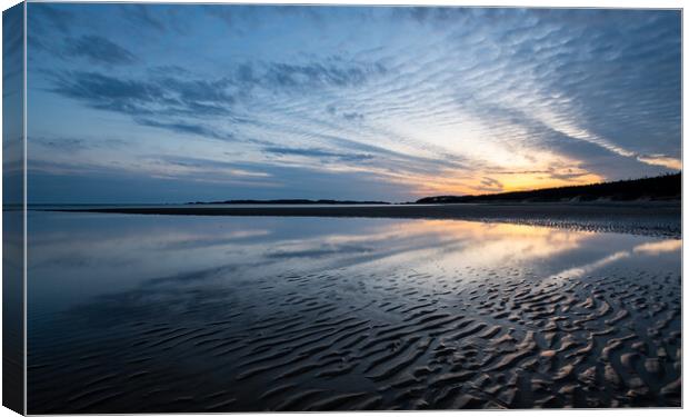 Sunset on Newborough beach, Anglesey Canvas Print by Andrew Kearton