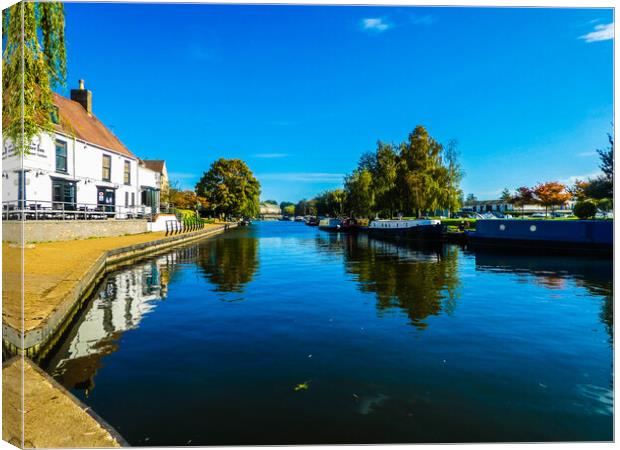 Serene Reflections on River Ouse Canvas Print by Simon Hill