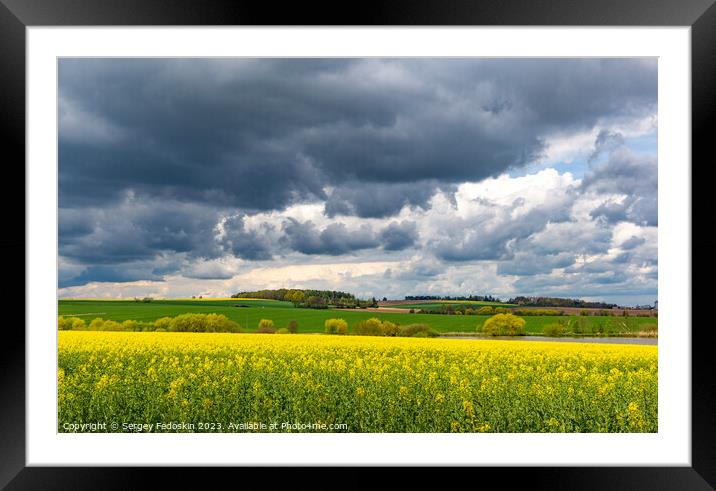 European landscape with spring fields. Canola fields. Framed Mounted Print by Sergey Fedoskin