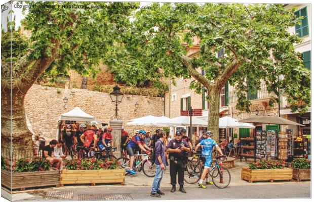 The Busy Plaza At Fornalutx Mallorca Canvas Print by Peter F Hunt
