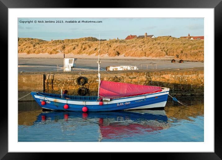 Fishing Coble moored in Beadnell Harbour Northumberland  Framed Mounted Print by Nick Jenkins