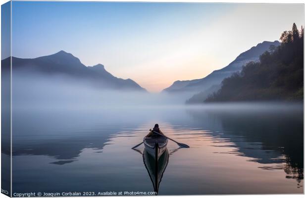 The morning mist cools the calm lake on which a lone canoe float Canvas Print by Joaquin Corbalan