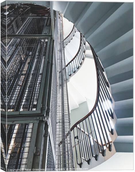 Vintage Caged Lift Shaft & Spiral Staircase In An  Canvas Print by Peter Greenway