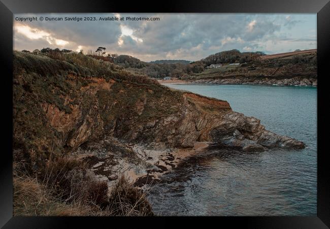 Looking towards Maenporth Beach at sunset Framed Print by Duncan Savidge