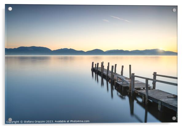 Wooden pier on the lake at sunrise. Torre del Lago Puccini Acrylic by Stefano Orazzini