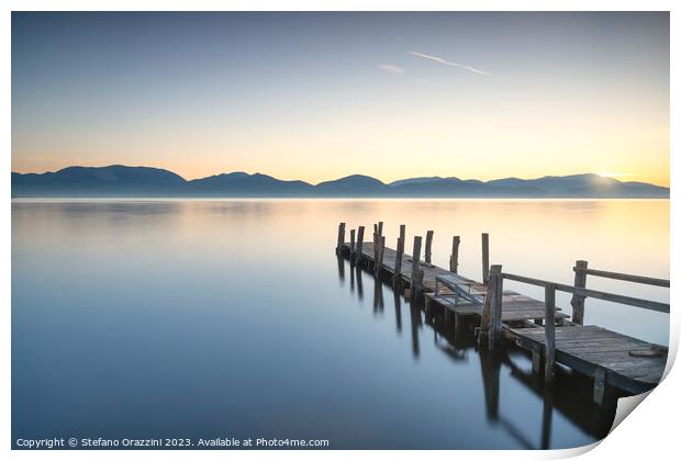 Wooden pier on the lake at sunrise. Torre del Lago Puccini Print by Stefano Orazzini