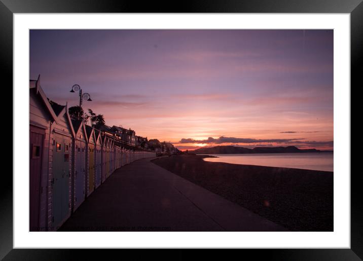 Beach hut sunrise at Lyme Regis Framed Mounted Print by Richard North