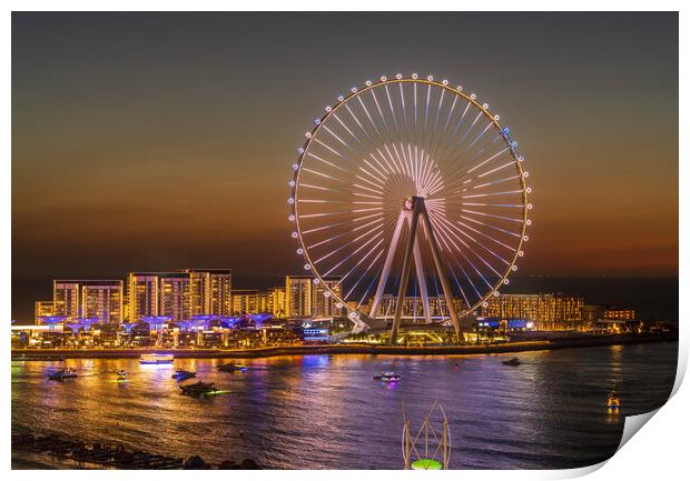 Light show on Ain Dubai observation wheel at sunset Print by Steve Heap