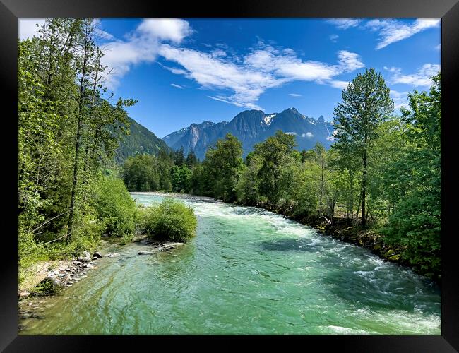 Gem green color Skykomish river with snowcapped cascade mountain Framed Print by Thomas Baker