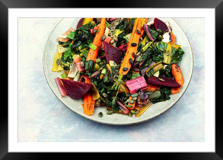 Vegetarian warm salad of stewed vegetables and chard leaves. Framed Mounted Print by Mykola Lunov Mykola